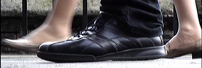 Pedestrian Thoughts: Waiting in the Street Looking Squatting Filming Taking Time